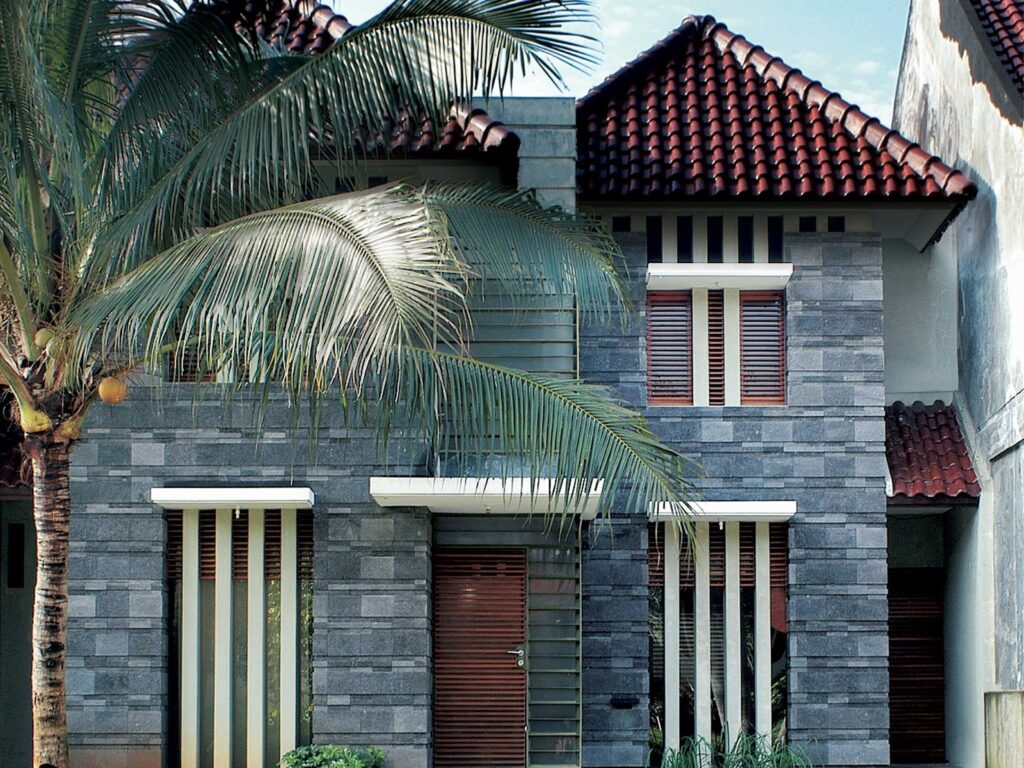 Desain rumah minimalis 2 lantai konsep modern batu alam